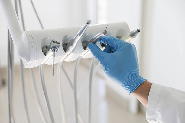 Professional Emergency Dentist technician working in Coleman, MI
